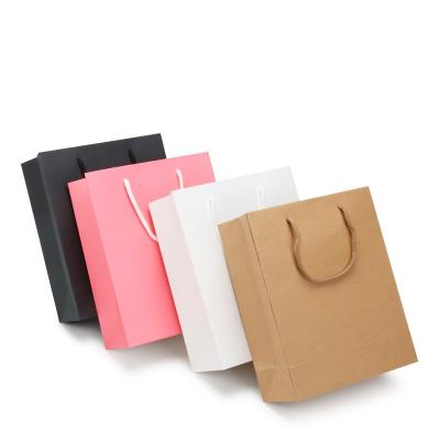 China Recycled Materials Wholesale Custom Color Pattern Paper Shopping Bags Clothes Shoes Gift Shopping Handbags for sale