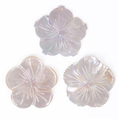 China Wholesale Natural Plum Blossom Shell Shaped High Quality White Shell Horseshoe Snail Shell For Jewelry Production for sale