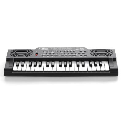 China Toy Amazon Hot Selling 37 Keys Battery Operated Piano Toys Kids Electric Musical Instrument with Microphone Keyboard Toys for Child for sale