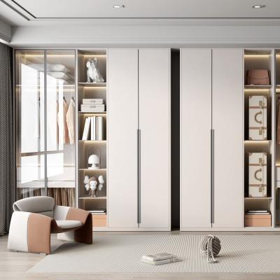 China Adjustable (height) UV highlight Wardrobe Closet Frame Cabinet Modern bedroom furniture designs cupboard customized couple wardrobes for sale