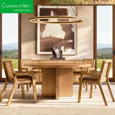 China Conjunto de comedor de patio de teakwood Muebles de madera moderna con sillón de madera maciza y silla lateral en venta