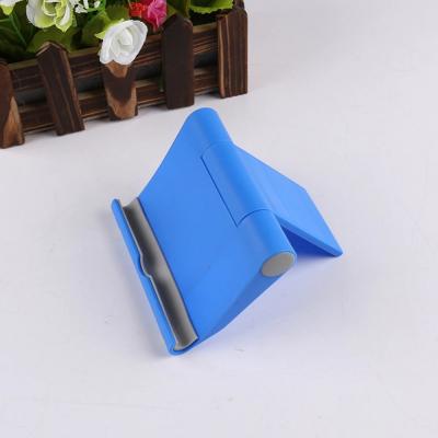 China Adjustable angles portable foldable and easy to use portable stand holder can be used as a medium for cell phones and tablets for sale