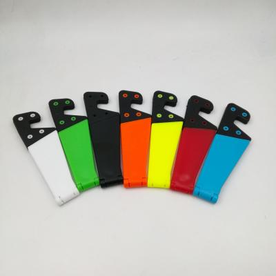 China Easy Install Promotional Gift Plastic Cell Phone Bracket Folding Mini Holder for sale