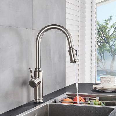 China Pull Out Spray Brushed Nickel Kitchen Faucet USA Hot Sales Pull Out Spout Kitchen Tap 360 Rotation Pattern Double Hot Cold Water Mixer Tap for sale