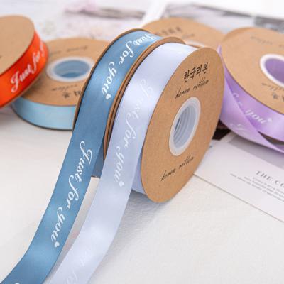 China Materials China Factory Wholesale Recycled Custom Silk Satin 25mm Polyester Printed Brand Logo 20Yards/Roll Ribbon Roll for sale