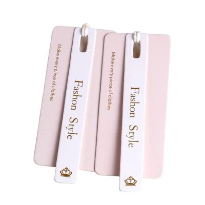 China Recycled Materials Customized Luxury White Pink Special Paper Folder Clothes Shoes Hang Garment Label Tags With String for sale