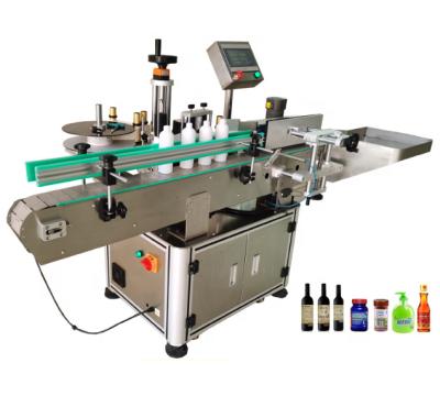 China Automatic Food One Side Wet Glue Labeling Machine For Bottles for sale