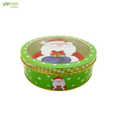 China Food Customized Round Santa Print Christmas Gifts Tin Box, Cookies Candy And Chocolate Tin Cans With Clear Pvc Plastic Window for sale