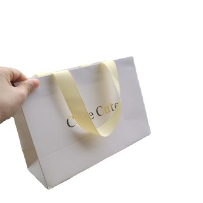 China Custom Luxury Brown White Brown White Gift Bag Recycled Craft Kraft Paper Materials Logo Packaging Paper Bags With Your Own Logo for sale