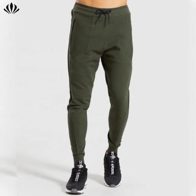 China Wholesale Sportswear 100%Nylon Tapered Slim Fit Mens Breathable Design Trouser Pants Zipper Pocket Custom Sweatpants for sale