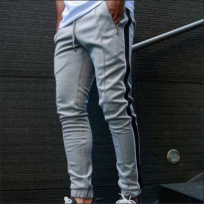 China Anti-pilling striped fitness casual pants sports track pants mens sweatpants mens jogger pants for sale