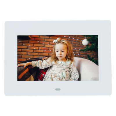 China Factory Direct Selling Clock 2021 DPF-7010 Auto Rotate Video Photo Playback Loop 7 Inch Digital Photo Picture Frame for sale