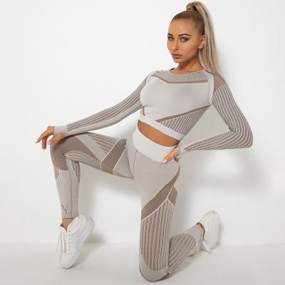 China Breathable High Quality Women Seamless Stripe Long Sleeve Cavity Blouse Women Gaiters Pants Set Solid Color Workout Yoga Tracksuit for sale