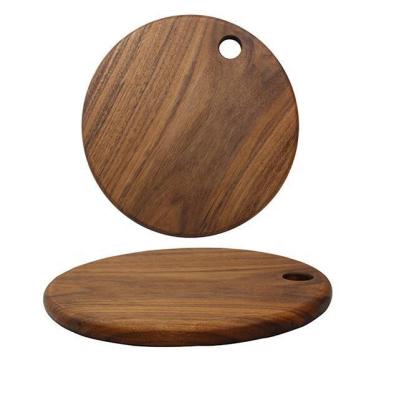 China Sustainable Cutting Board Round Wood With Hanging Hole Kitchen Cheese Board Wholesale for sale