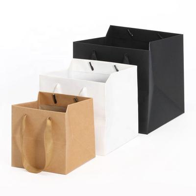 China Recyclable Wholesale Custom Kraft Paper Gift Paper Shopping Bag Black Square Packaging Bag With Your Logo for sale