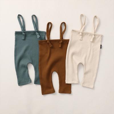 China Baby Diary Clothes Newborn Baby Clothes Tie Up Soft Solid Cotton Baby Plain Fabric 100% Baby Sling Canvas Pants Overall for sale