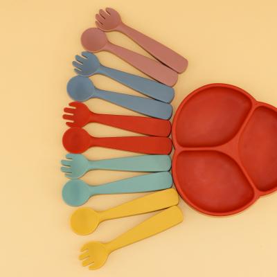 China Bpa Non-Toxic Defensive Stance Silicone Baby Self Fork Stocked Feeding Training Utensils Set Soft Silicone Baby Spoon Fork Set for sale