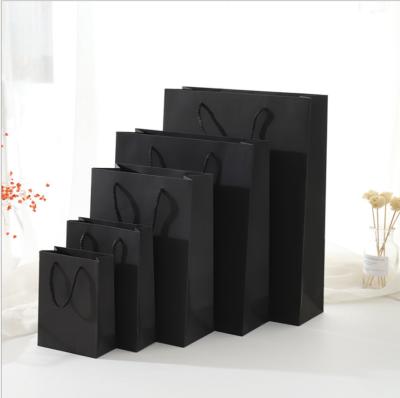 China Recycled Biodegradable Tote Bag Food Shoe Bread Storage Bag Paper Stock Bolsas De Papel Shopping Tote Gift Hand Bag Black Packaging Materials for sale