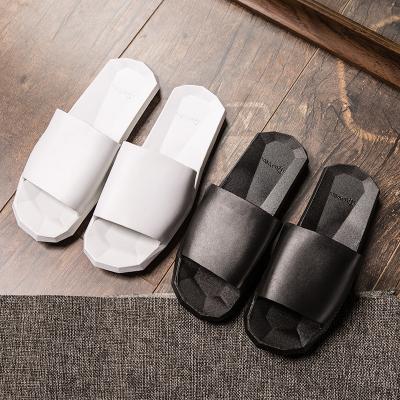 China OEM Custom Logo Black And White Slides Mens Slippers PVC Fashion Trend Sandals Shape Designer Boy Slippers for sale