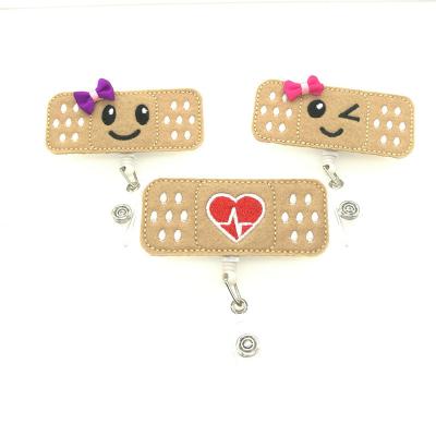 China Wholesale Customized Nurse ID Badge Retractable Retractable Bandage Badge Cartoon ECG Attendance ID Card Badge Lovely With Clip for sale