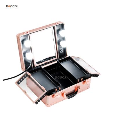 China Professional High Quality Koncai Vanity Case With LED Lights Portable Aluminum Suitcase Makeup Case for sale