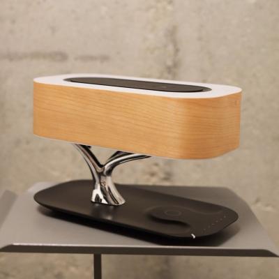 China Wireless Charger For New Mobile Phone B2C Hometree Multi Functional Wooden Desk Lamp Bedroom Table Lamp With Speaker Wireless Radio Night Fill Light for sale