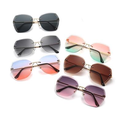 China Rimless Designer Gradient Sun Glasses Brand UV400 Sunglasses Women Fashion Sun Glasses For Female for sale