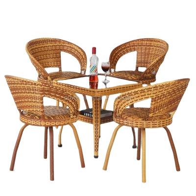 China Cheap Modern Synthetic Wooden Wicker Garden Restaurant Peacock Flower Easy Carry Bamboo Rattan Arm Chairs And Tables for sale