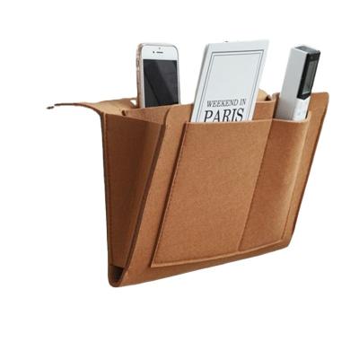 China Minimalist Cheap High Quality Head Sofa Sundries Storage Box Magazine Storage Hanging Remote Control Felt Bag for sale