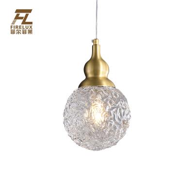 China Modern Bump Tracing Gloden Glass Contemporary Postmodern Adjustable Single Head Creative Simple Shade Pendant Lamp for sale