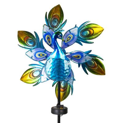 China Morden Solar Wind Spinners Peacock Glass Sculpture Led Solar Garden Light for Yard Garden Pathway for sale