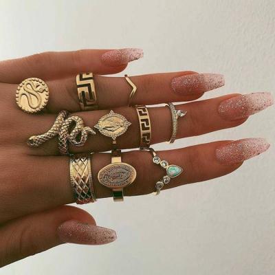 China Nickel Free 10 Pcs / Set Geometric Gypsy Coins Buddha Statue Carving Knuckle Rings Women Gold Snake Punk Ring Sets for sale