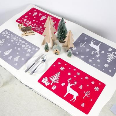 China 12pcs Merry Christmas 2021 PVC Christmas Place Mat Square Printing Mat Coaster Viable Home Decoration Table Mat for sale