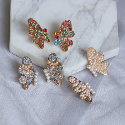 China Environmentally Friendly Women's Rainbow Color Rhinestone Diamond Pearl Butterfly Stud Earrings Jewelry for sale