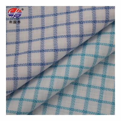 China Eco-friendly Anti-bacteria 38 38 polyester 14 tencel 10 lotus bamboo yarn dyed fabric for shirt for sale