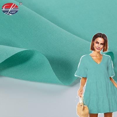 China Gigh Quality Soft Customized Anti Pill Solid Green 68*68 Pure Rayon Fabric For Shirt for sale