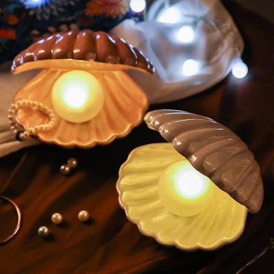 China Modern Nordic pearlized ceramic INS shell trinket box with LED light for girls night romantic small lamp decorative ornaments for sale