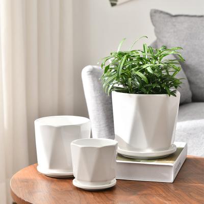 China Not easy to deform Nordic simple ceramic flower pot with large tray green dill and decorative planter flower pot customized flower pot for sale