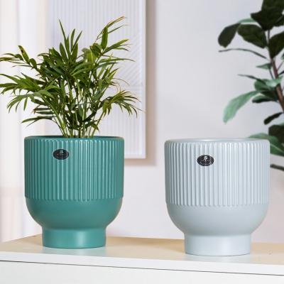 China Not easy to deform straight European style round Morandi flower pot ceramic three-piece cheap plastic flower pots wholesale for sale