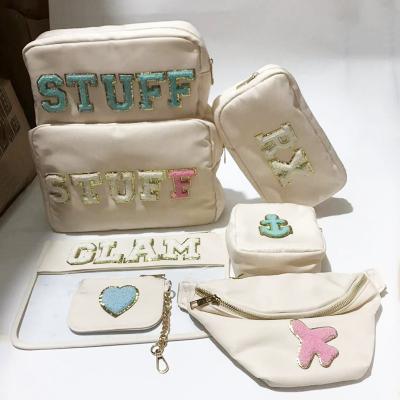 China Custom Stock 10 Colors Waterproof Nylon RTS Varsity Letter Patches Makeup Custom Toiletry Pouch Gifts Bridesmaid Women Cosmetic Bag for sale