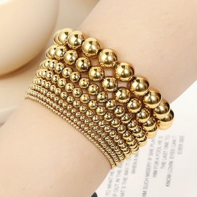 China FASHIONABLE High Quality 18K Gold Plated Metal Steel Ball Bracelets Diameter 3-8mm Stainless Steel Smooth Bead Elastic Bracelet for sale