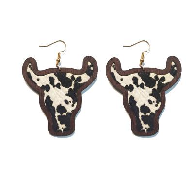 China Retro CLASSIC Personalized Cow Pattern Horsehair Love Heart Bull Head Waterdrop Wood Frame Stud Earrings For Women for sale