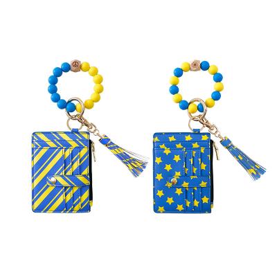 China Fashionable PU Ukraine Flag Pattern Leather Silicone Beads Leather Keychain Coin Purse Nine-Card Wallet Key Chain Leather Tassel Keychain for sale