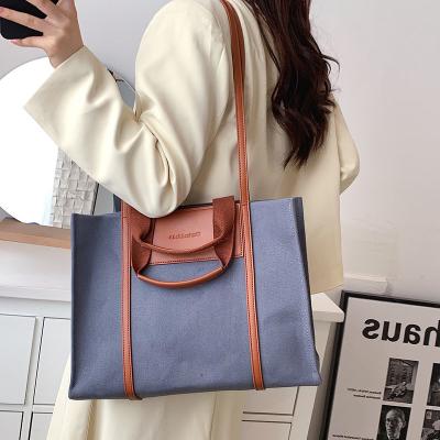 China 2022 South Korea New Portable Fashion PU Handle Canvas Bag Large Capacity Simple Single Shoulder Tote Bag for sale