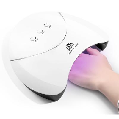 China New 36W Portable Handheld Nail Machine With Box Machine Box Therapy Light Induction Automatic Nail Dryer Timing UV Lamp B1 for sale