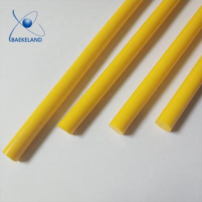 China Yellow solid plastic delrin pom rods polyacetal delrin rod POM rod acetal price per kilogram for sale