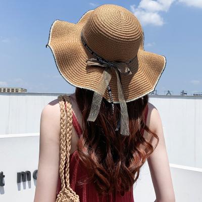 China Wide Brim Straw Hat Wave Brim Wholesale 2022 Bowknot Sun Beach Summer Umbrella Eco-friendly Hats for sale