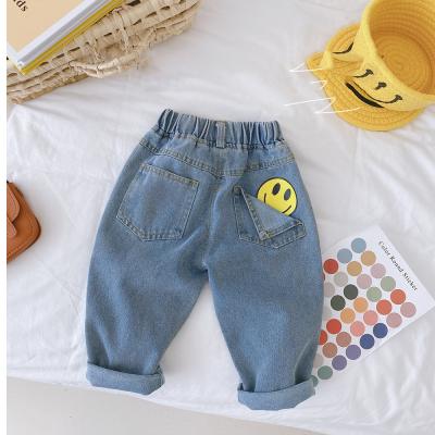 China Anti-pilling Wholesale Cute Blue Elastic Waist Smile Print Denim Kids Baby Jeans Pants for sale