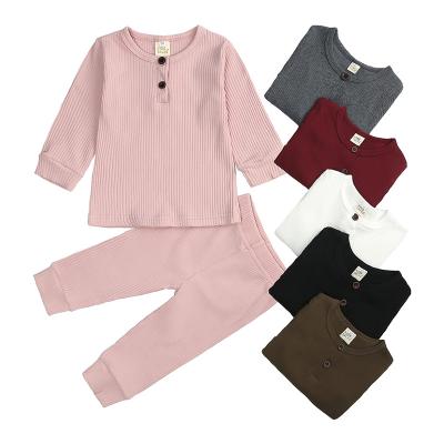 China Hot Selling Unisex Pajamas Breathable For Boy And Girl Solid Color Long Sleeve And Pants Kids Sleepwear for sale