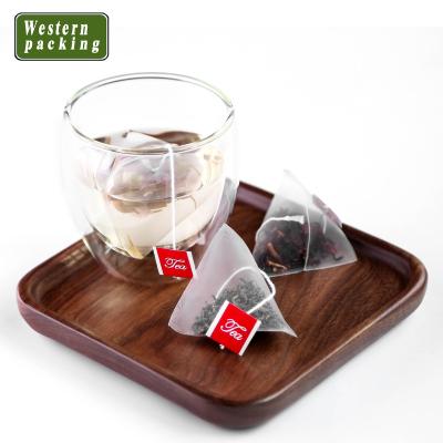 China Biodegradable silk material empty nylon tea bag triangle pyramid tea bag packaging with string and tag for sale